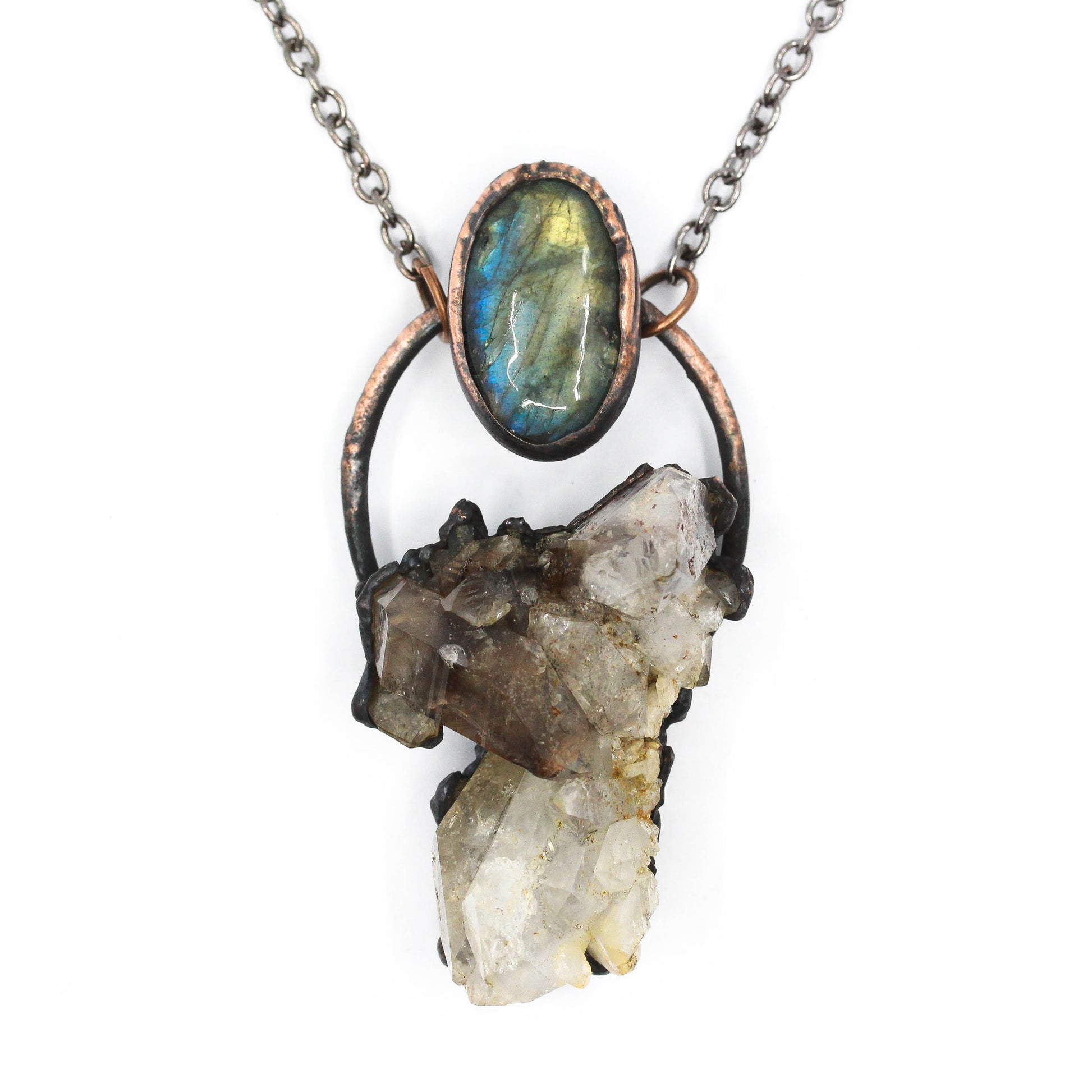 Necklace with Labradorite stone and crystal pendant on a white background