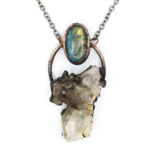 Necklace with Labradorite stone and crystal pendant on a white background